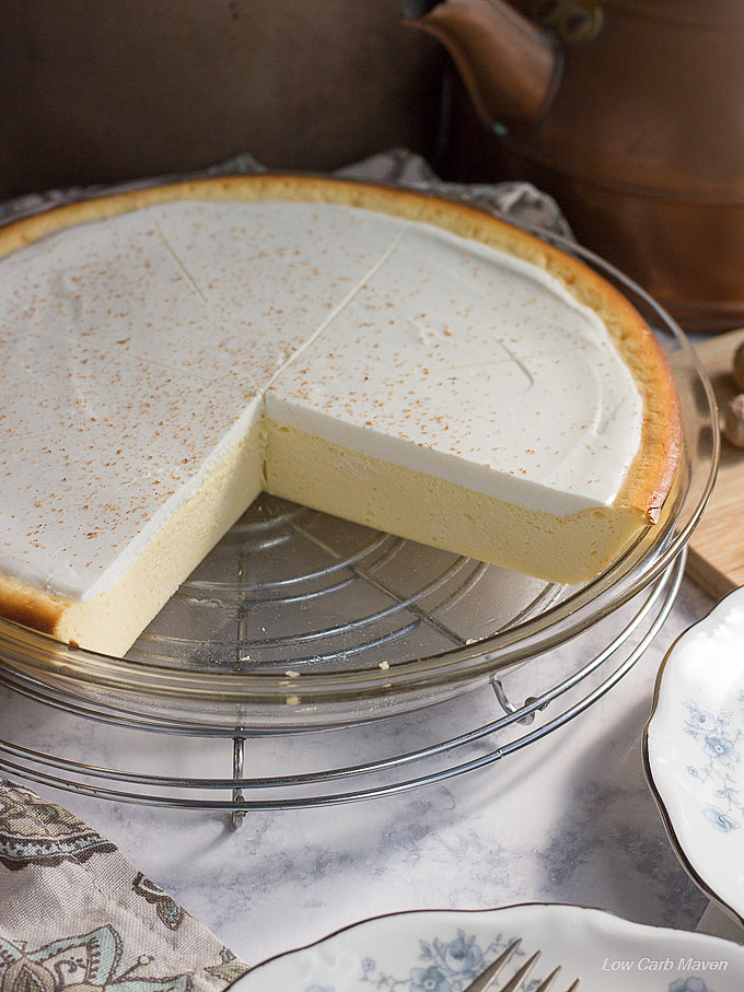 Cheese pie or crustless cheesecake with sour cream top in a pie plate.