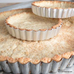 This Almond-Coconut Tart Crust is nice with coconut milk pastry cream, lemon curd and fresh fruit | Low carb, Gluten-free, Casein-Free | lowcarbmaven.com