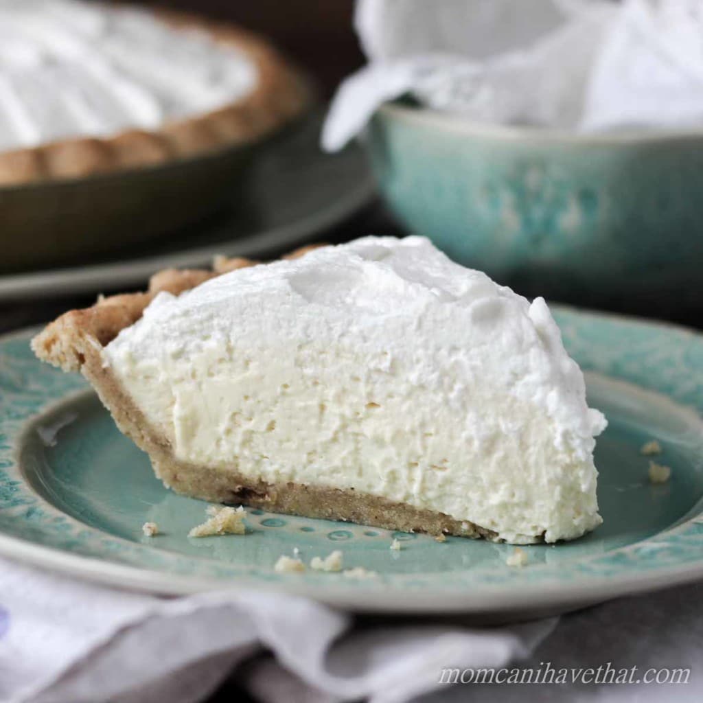 Slice of fluffy banana cream pie on green plate. low carb, keto recipe