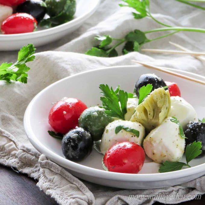 https://d104wv11b7o3gc.cloudfront.net/wp-content/uploads/2015/07/caprese-salad-with-olives-61.jpg