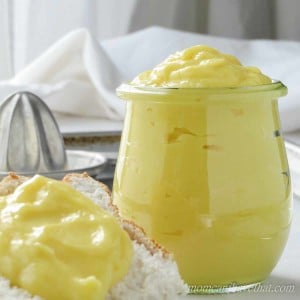 Thick sugar free lemon curd in jar and slathered on angel food cake.