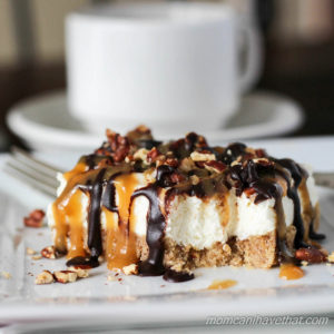 Pecan Turtle Cheesecake Bars have a brown sugar pecan crust & light-textured vanilla cheesecake topped with toasted pecans, chocolate fudge, & caramel. No-bake, low carb & sugar free | lowcarbmaven.com