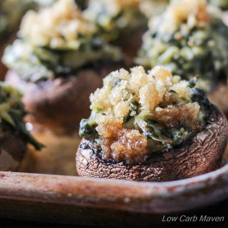 Two-Bite Spinach Artichoke Stuffed Mushrooms are the perfect party bite! | Low Carb, Gluten-free, Keto, THM | LowCarbMaven.com