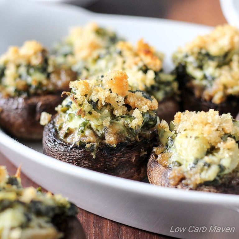 Two-Bite Spinach Artichoke Stuffed Mushrooms are the perfect party bite! | Low Carb, Gluten-free, Keto, THM | LowCarbMaven.com