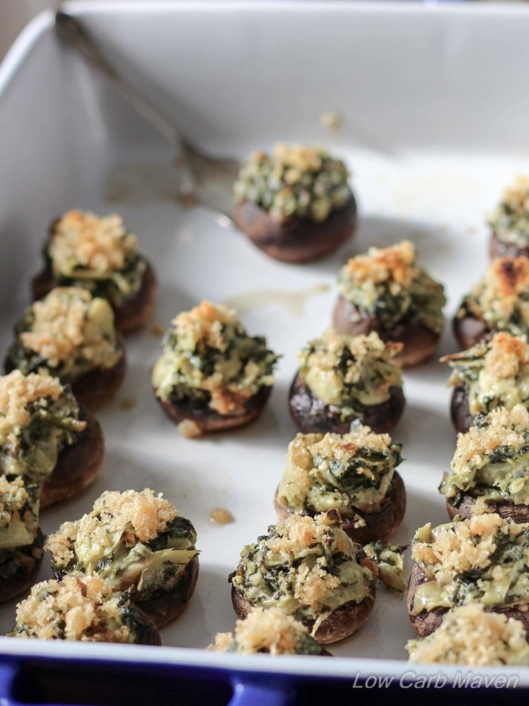 Two-Bite Spinach Artichoke Stuffed Mushrooms are the perfect party bite! | Low Carb, Gluten-free, Keto, THM | LowCarbMaven.com