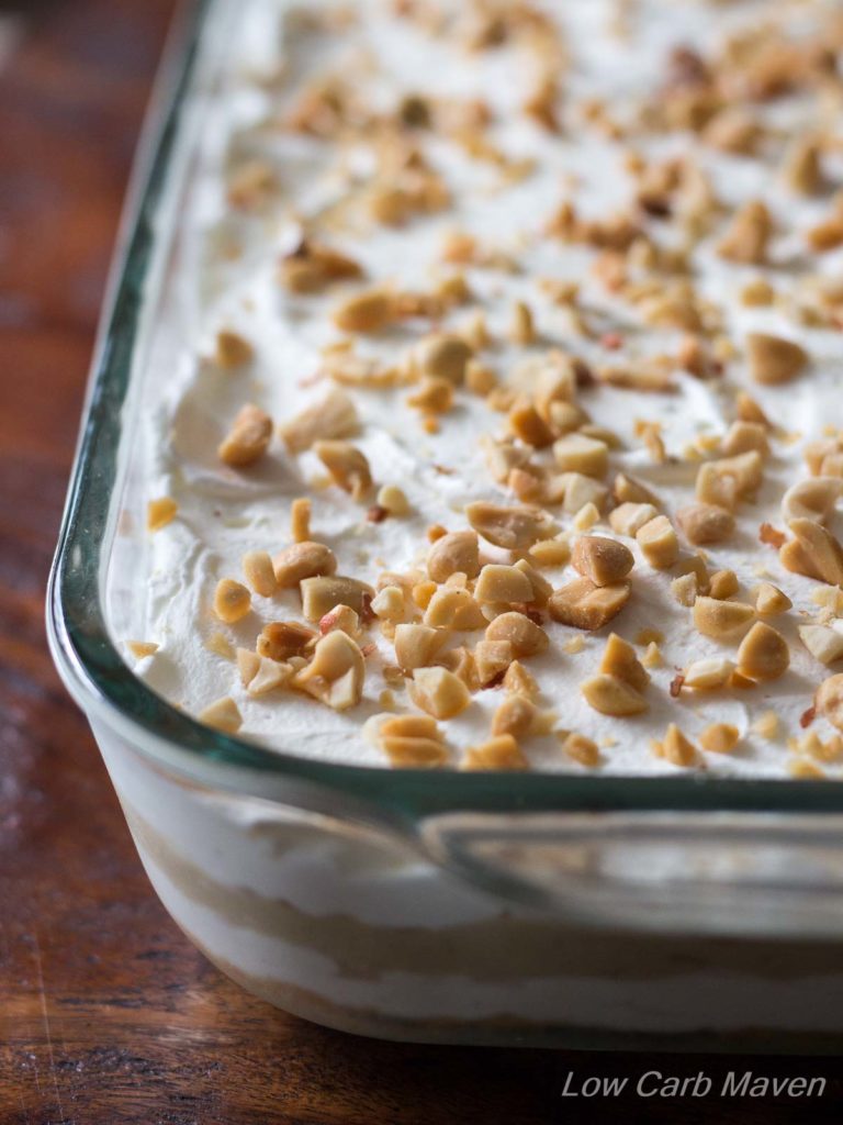 Peanut flour crust, silky cream cheese, rich peanut butter pudding, whipped cream. Made from scratch with wholesome ingredients! | low carb, gluten-free, keto, thm