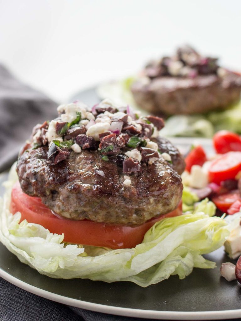 Low Carb Greek Lamb Burgers are great bunless lettuce wrapped burgers with feta cheese and Mediterranean flavors. 