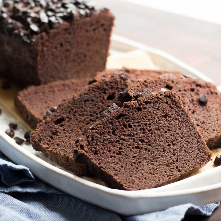 A low carb chocolate quick bread made of coconut flour and baked in a loaf pan. lchf, keto, thm