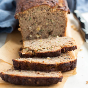 Sliced Low Carb Zucchini Bread on a cutting board.