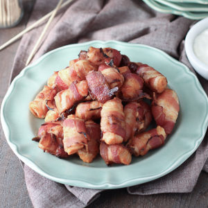Chicken marinated in Buffalo sauce, wrapped in bacon and baked until crispy. | low carb, keto, gluten-free