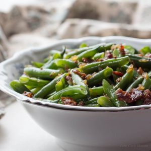 Sweet and Sour German Green Beans with Bacon and Onions is a tasty green bean recipe and easy low carb side.