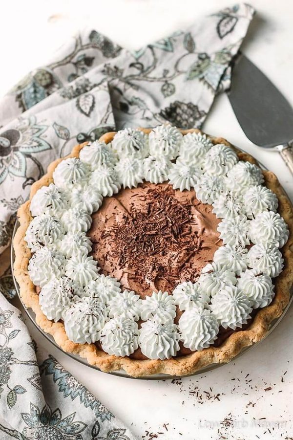 Sugar Free Chocolate Pie (French Silk Pie) with whipped cream and chocolate shavings is perfect for low carb diets.