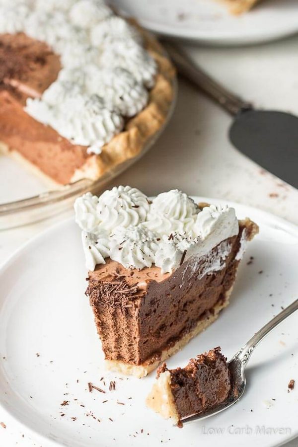 A slice of Sugar Free Chocolate Pie (French Silk Pie) with whipped cream and chocolate shavings.