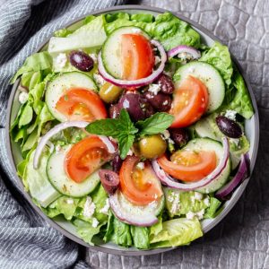 Traditional Greek salad recipe with Greek vinaigrette dressing.