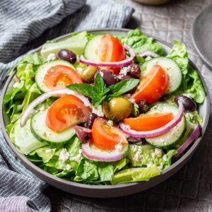 Traditional Greek salad recipe with Greek vinaigrette dressing.
