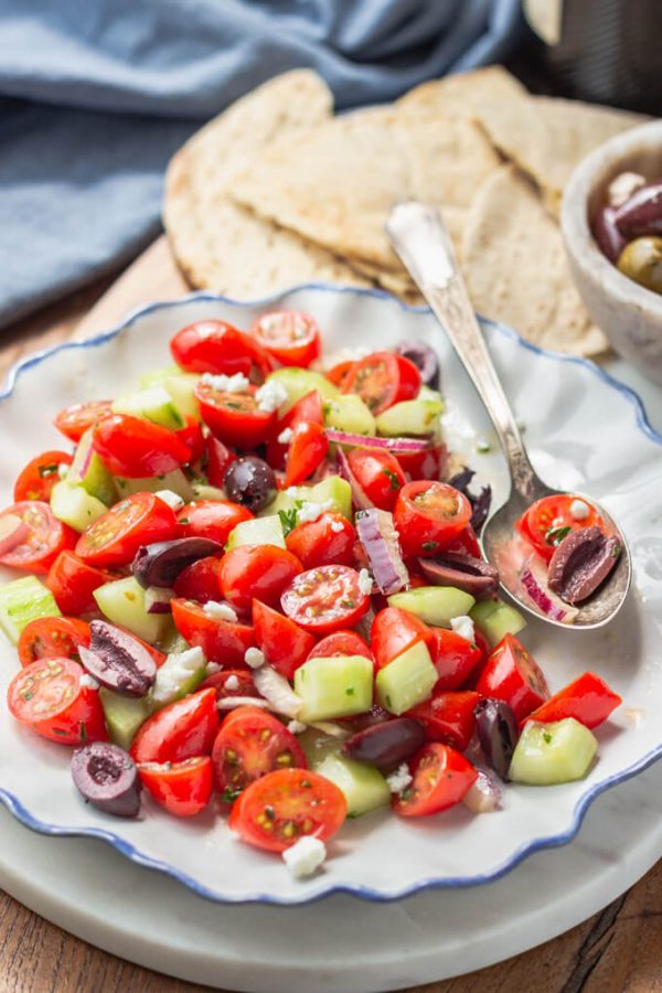 Mediterranean Cucumber Salad (Tomato and Cucumber Salad) with Kalamata olives, red onion, and feta cheese. #mediterranean #salad #tomato #cucumber #fetacheese #lowcarb #keto