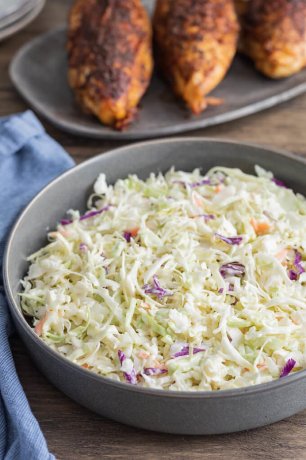 A bowl of keto coleslaw with BBQ chicken