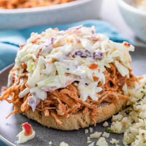 low carb shredded bbq chicken and coleslaw on a roll