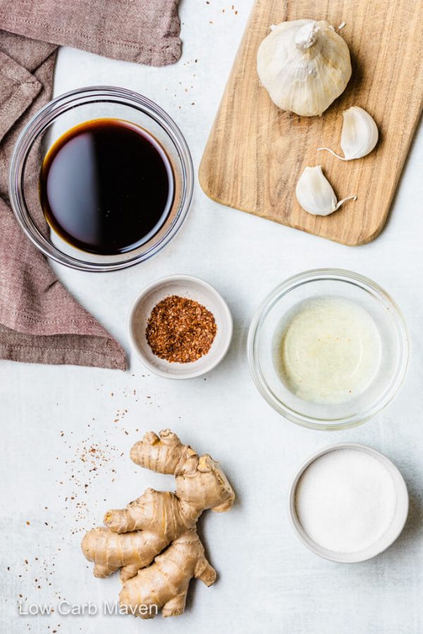 Teriyaki sauce ingredients: soy sauce, garlic cloves, red pepper flakes (optional), dry sherry or vinegar, fresh ginger, sugar substitute.